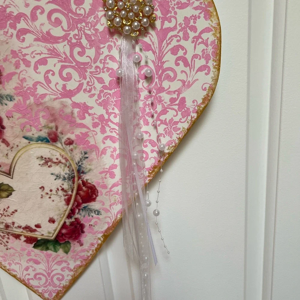 Elegant Pink Heart Wreath with Red Floral Design